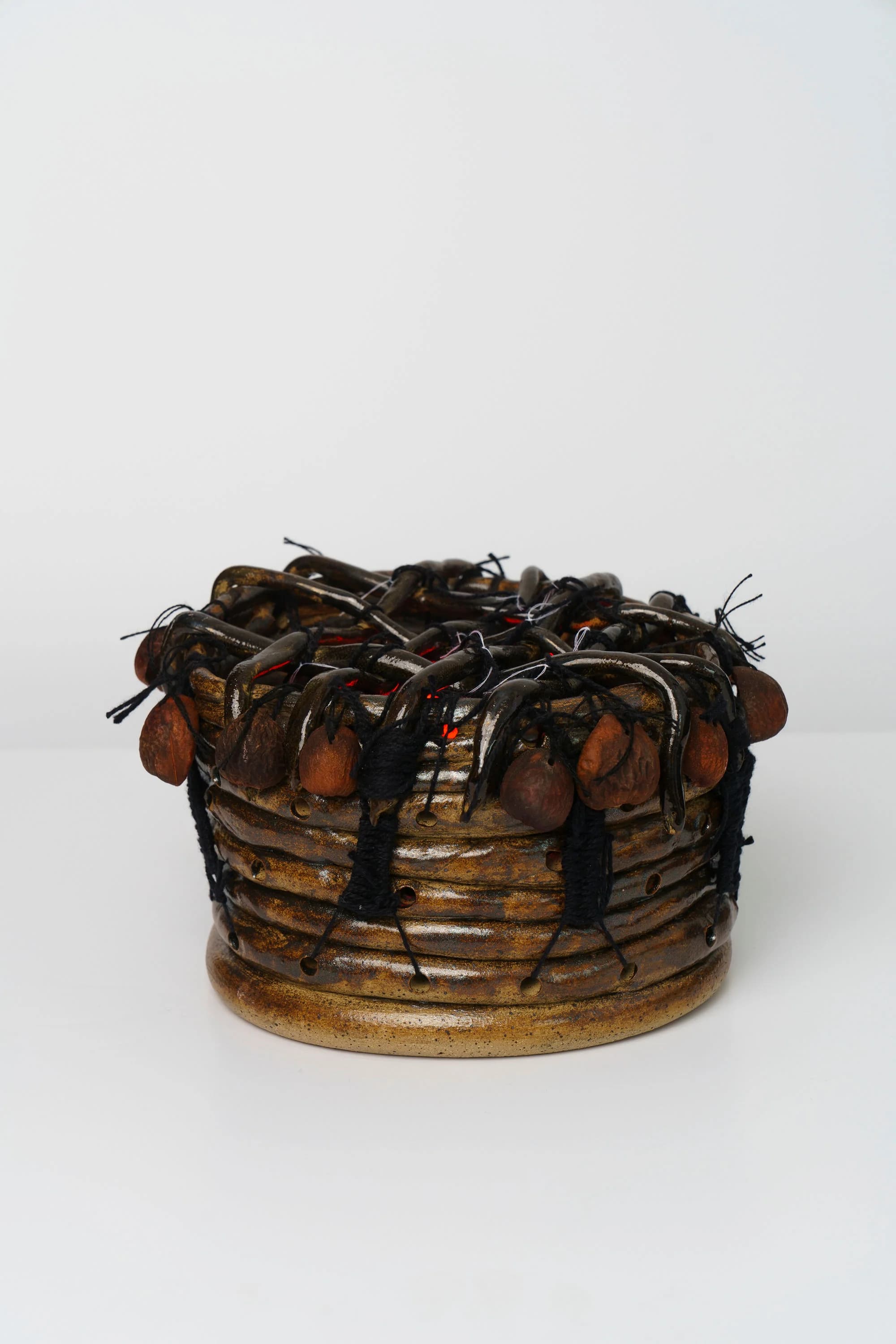 Clay Looms vertical composition with ceramic warp weights