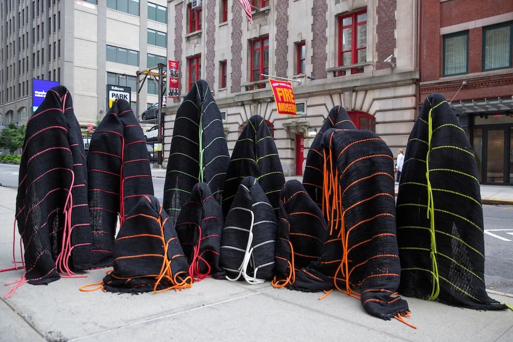 TechnoLove handwoven cocoon sculpture worn by dancer