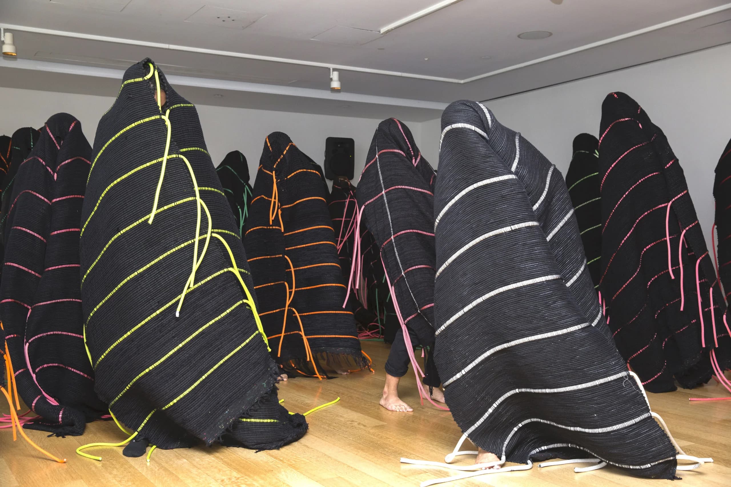TechnoLove exhibition view with handwoven sculptures