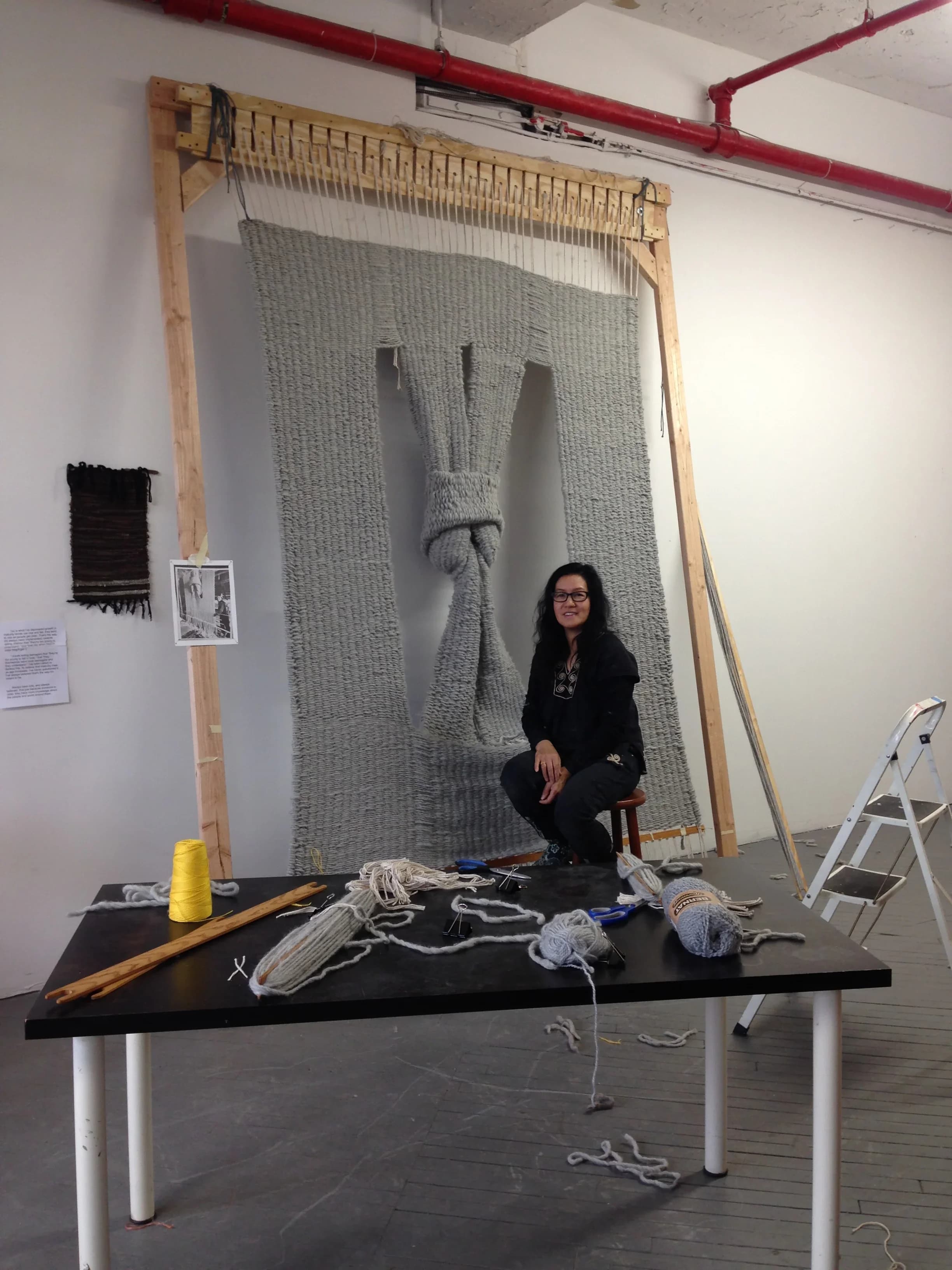 Fiber art wall hanging with layered textures