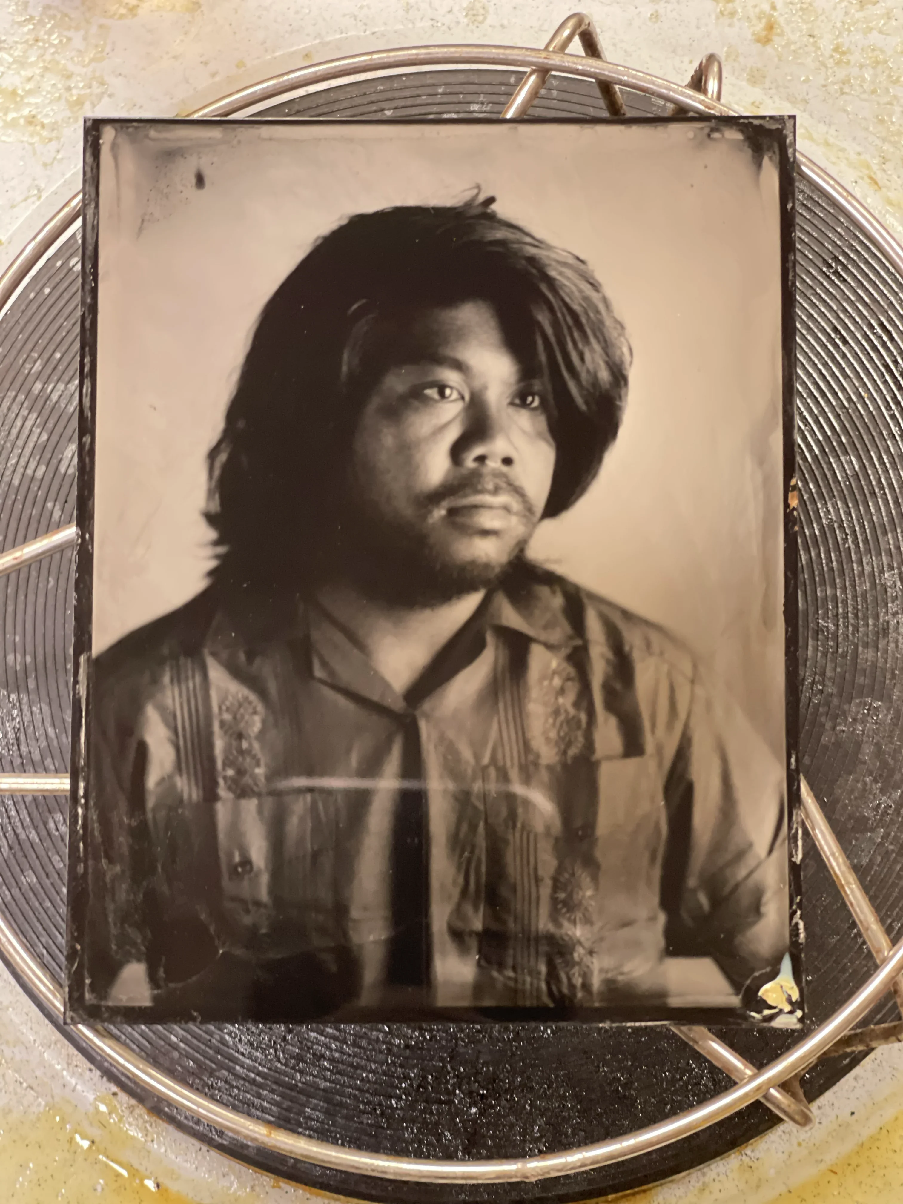 Tintype photograph capturing sculptural silhouette