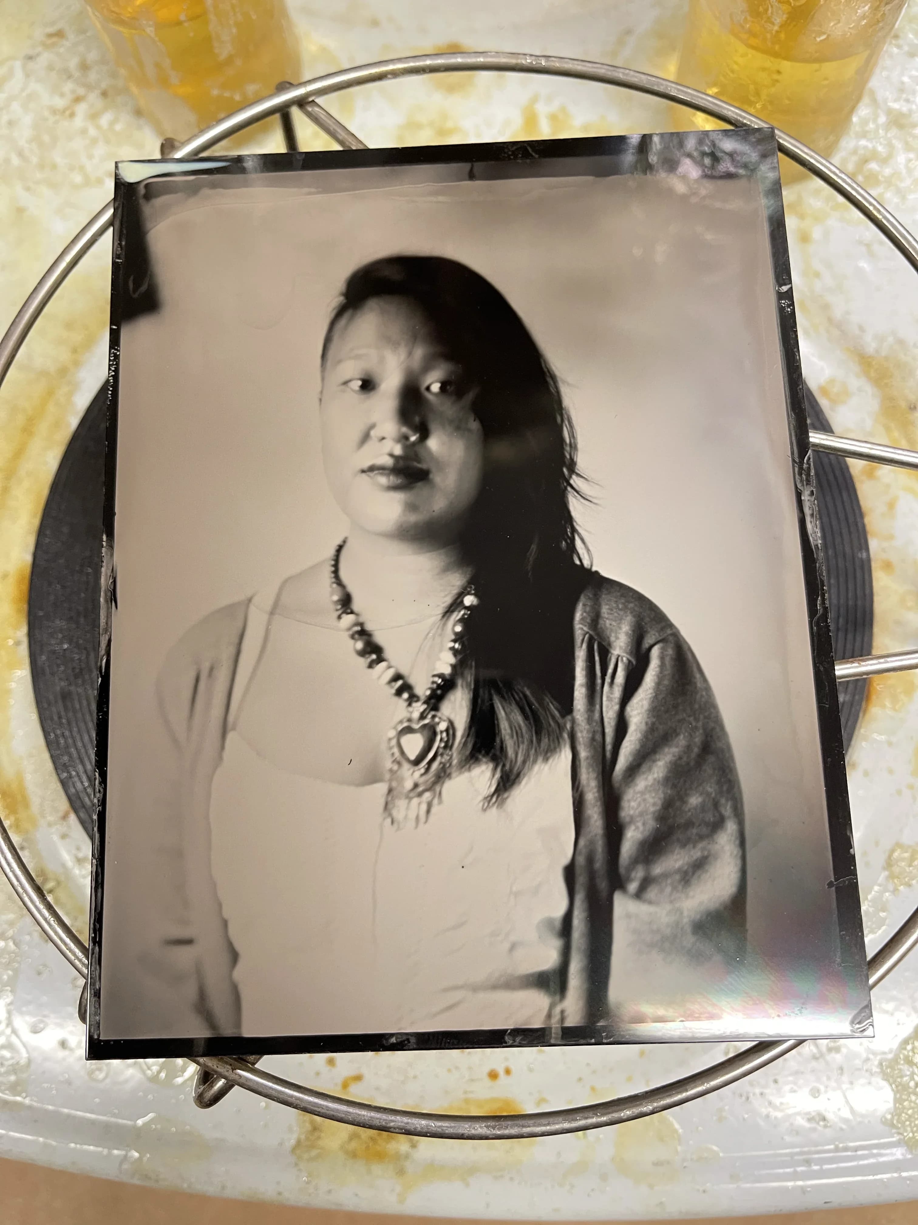 Tintype portrait of fiber work with warm highlights