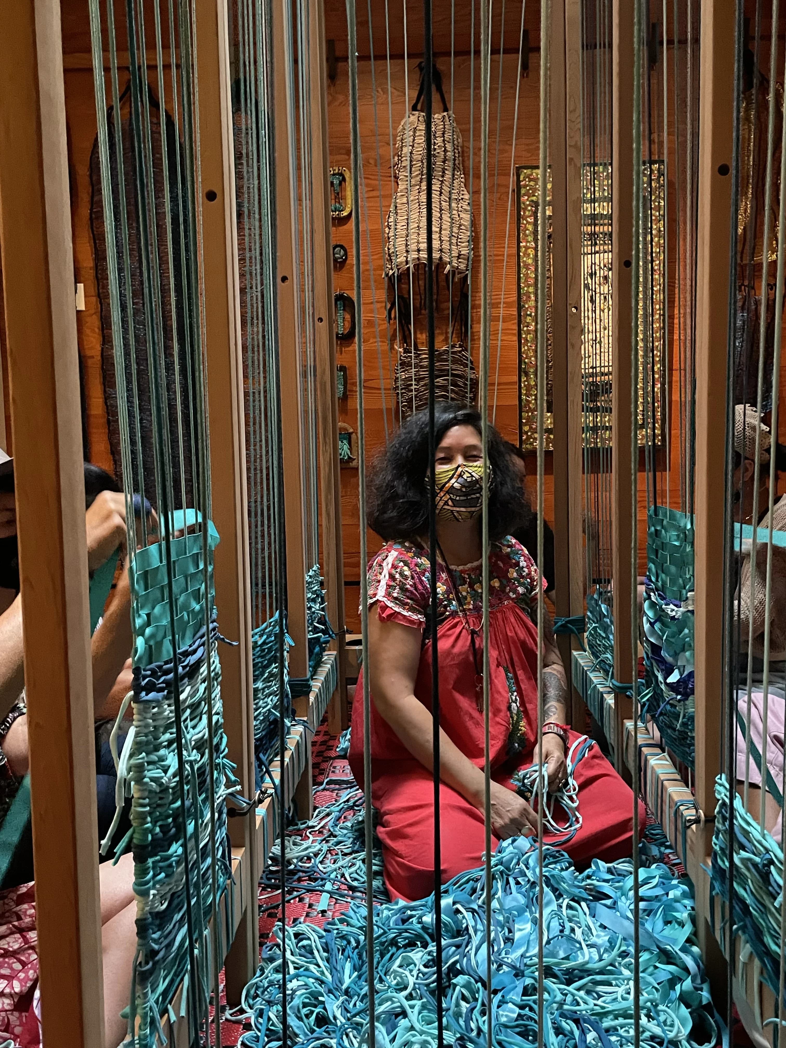 Community members weaving at Ace Hotel