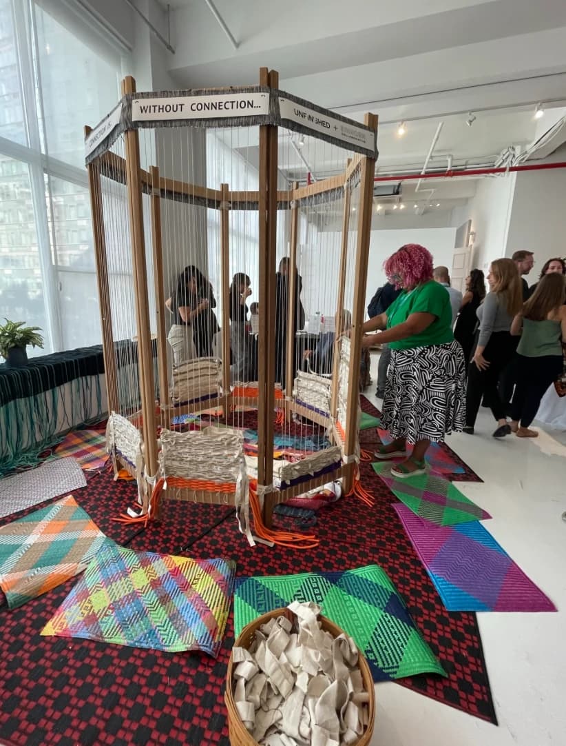 Participants at Einhorn Collective weaving event