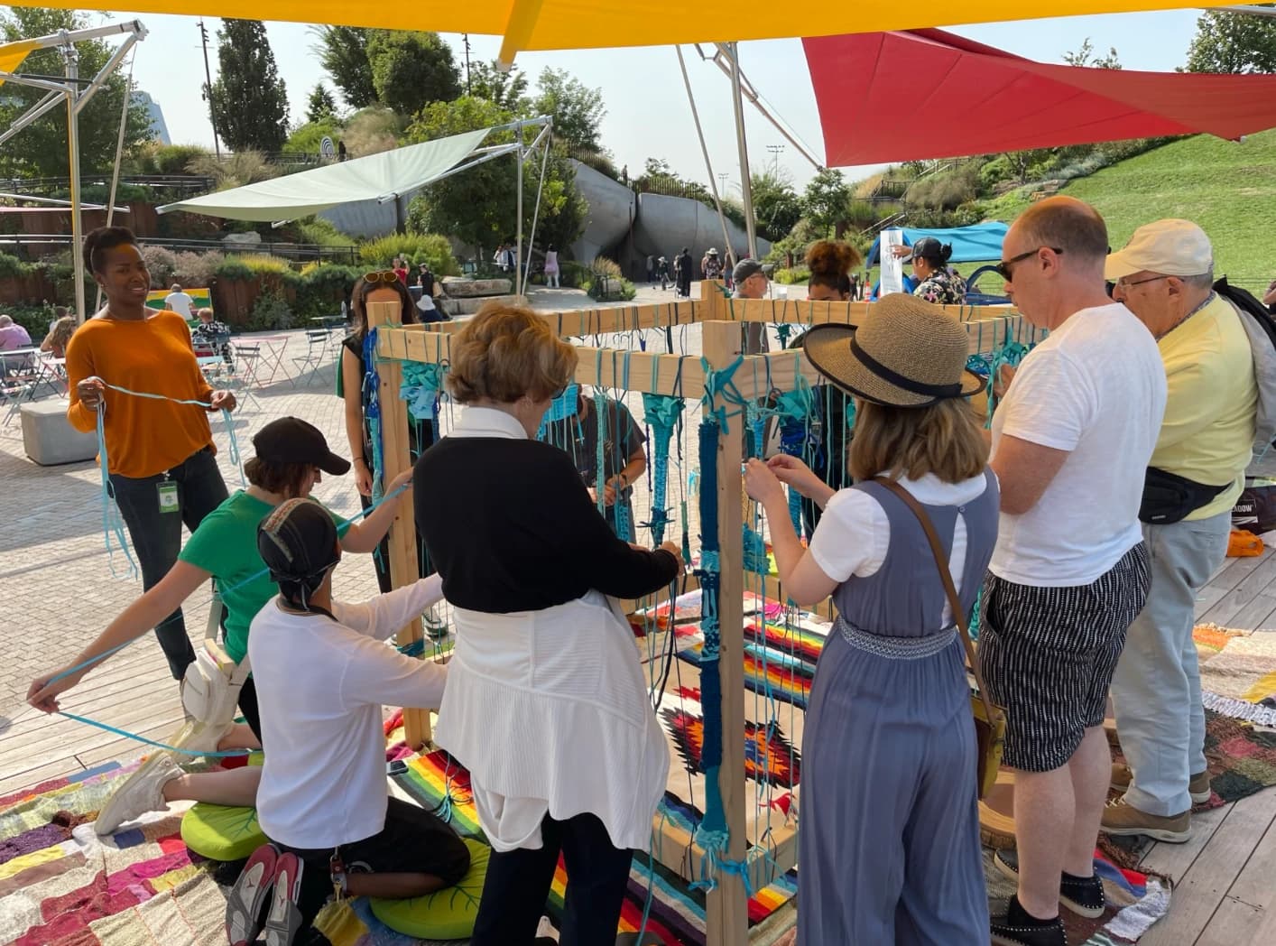 Community members at Little Island weaving event