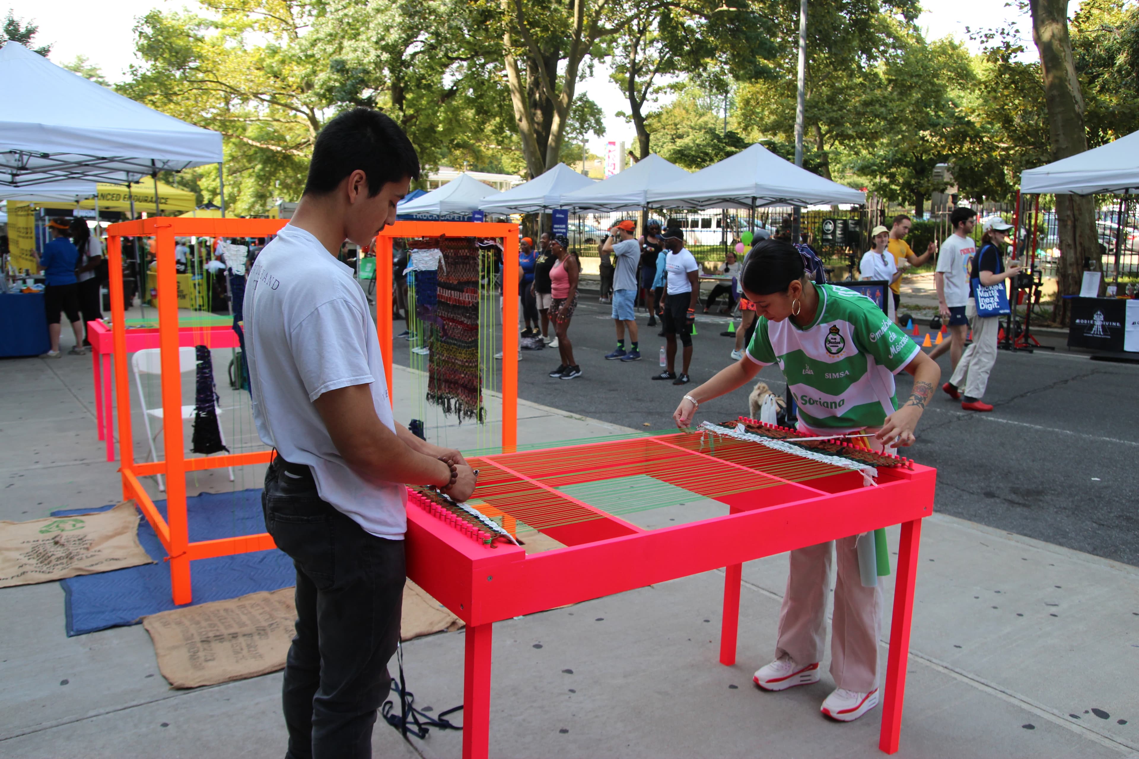 Participants weaving at Summer Streets